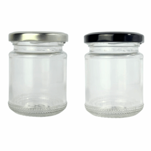 Bollón de vidrio 150ml con tapa metálica negra o plateada, ideal para cremas, velas artesanales, cosmética natural o productos a granel. Envase de vidrio resistente, presentación elegante.