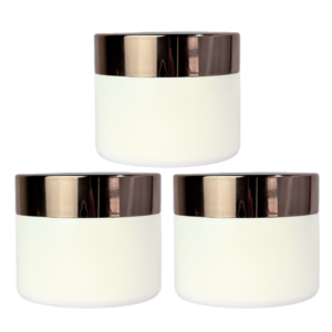 Pote de vidrio blanco esmerilado de 50g con tapa rosa pálido, ideal para cremas y productos cosméticos.